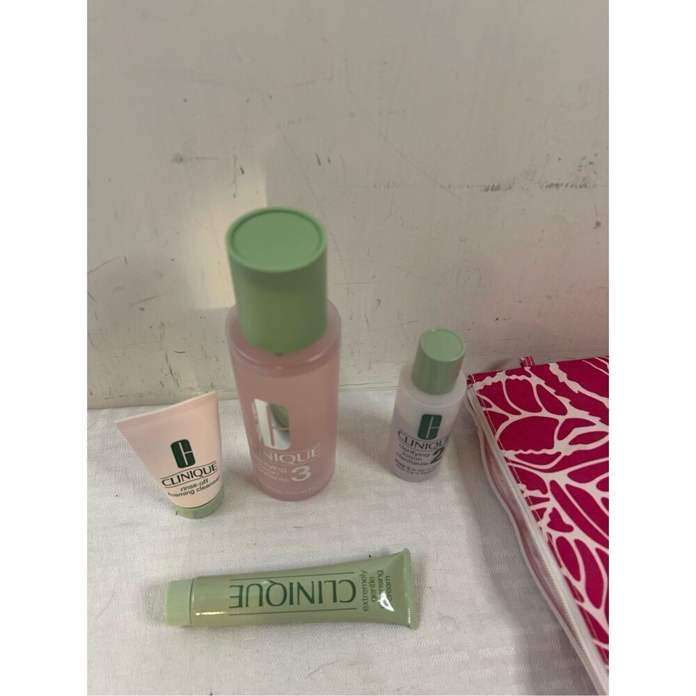 Clinque extremely‎ cleaning lotion products with pink bag cosmetics open lot